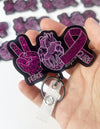 "Peace, Love, Cure" Badge Reel - Pink