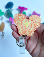 Pelvis Badge Reel - Yellow & Orange