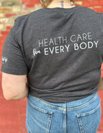 "Health Care for Every Body" Rainbow Heart of Healthcare Unisex T.Shirt