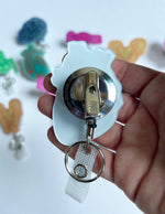 Heart Badge Reel - Teal & Red
