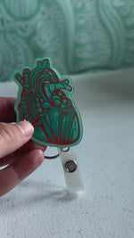 Heart Badge Reel - Teal & Red